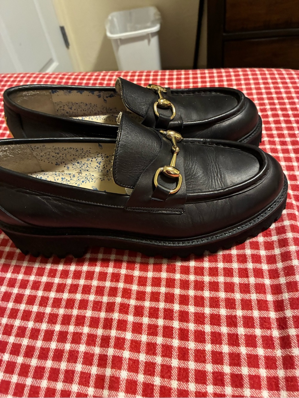Woman’s Black Leather Loafers with Gold Bit Detail